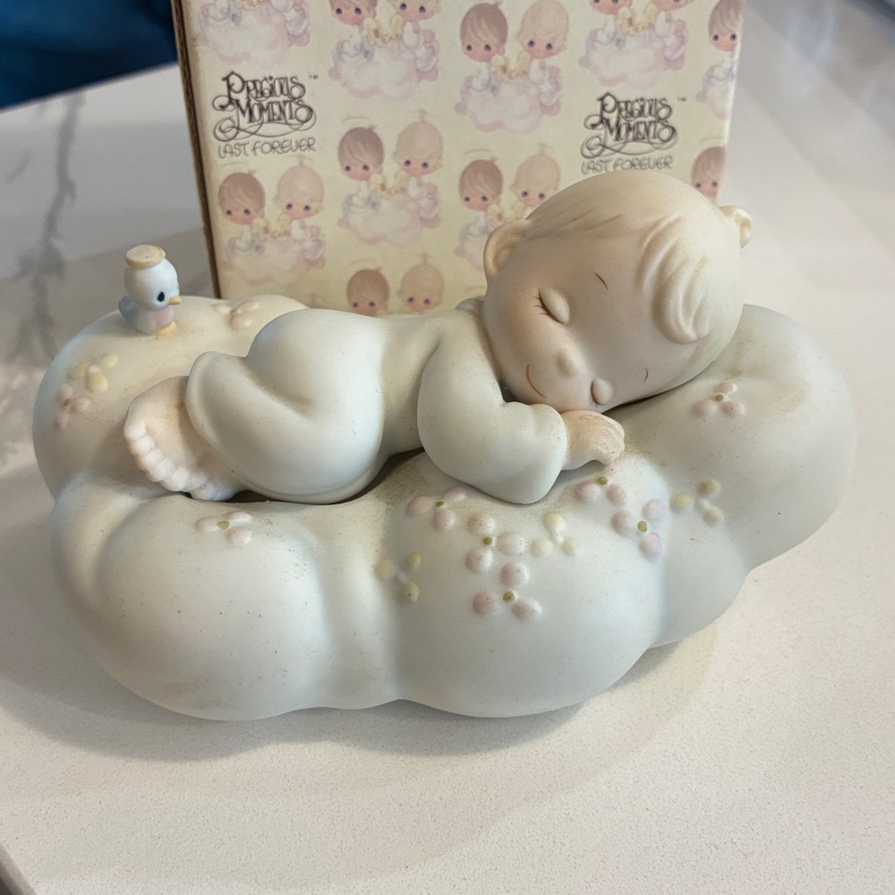 Precious Moments “Safe in the Arms of Jesus” Figurine